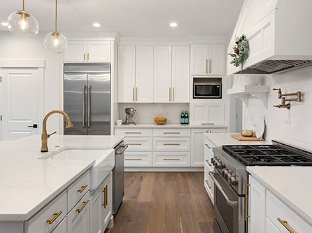 quartz countertop in kitchen with white cabinets